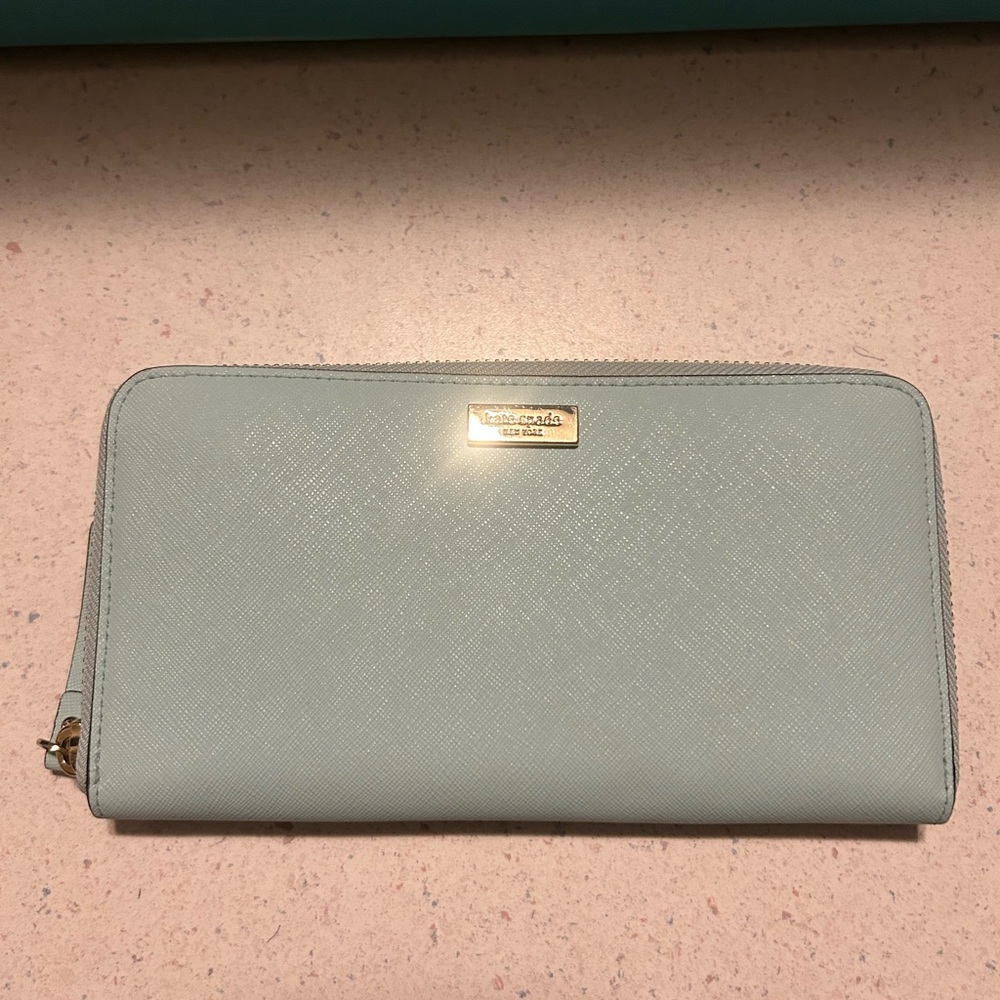 kate spade light blue zip-around wristlet clutch
